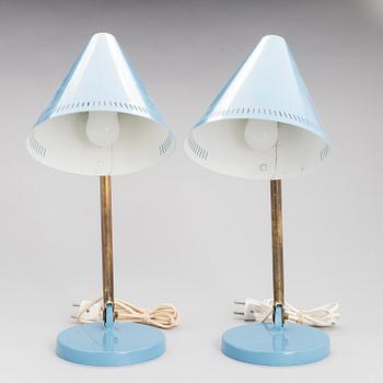 A pair of desk lamps by Paavo Tynell manufactured by Taito Oy.