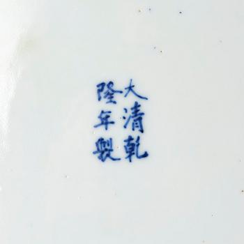A pair of five clawed dragon dishes, Qing dynasty with Qianlong mark.