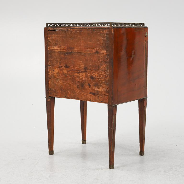 A late Gustavian mahogany-veneered chamberpot cupboard, late 18th century.