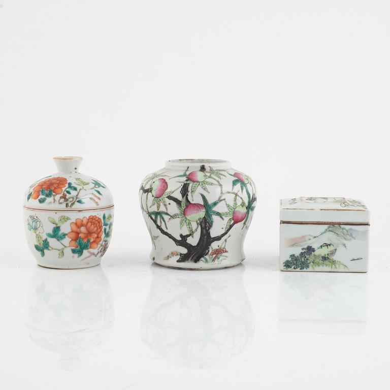 A Chinese famille rose peach vase, a jar and a box with covers, late Qing dynasty/20th century.