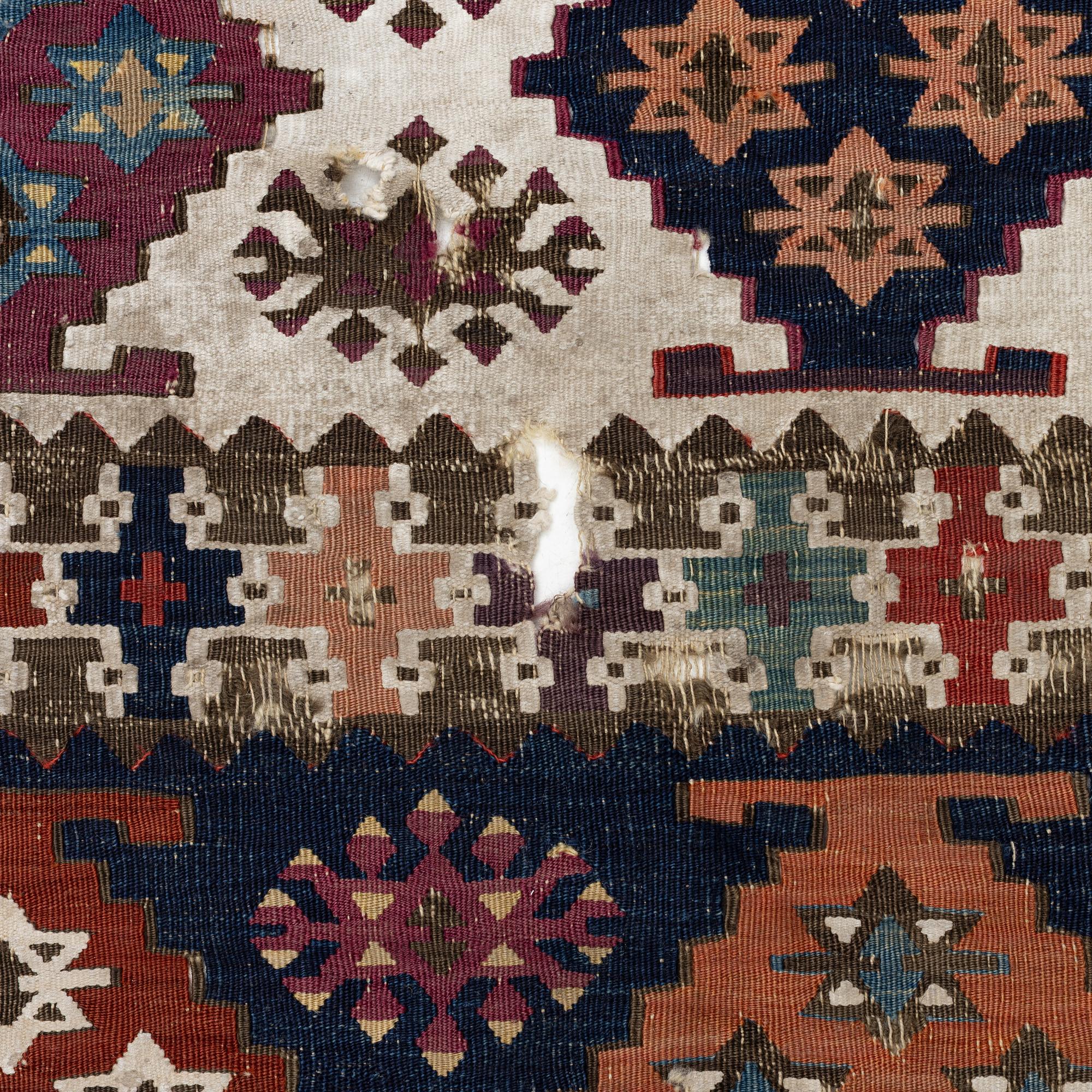 An antique kilim fragment, central Anatolia, c. 238 x 82 cm.