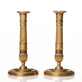 A pair of Empire candlesticks.