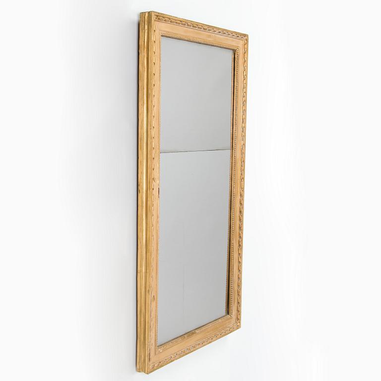 A late Gustavian style mirror, second half of the 19th century.