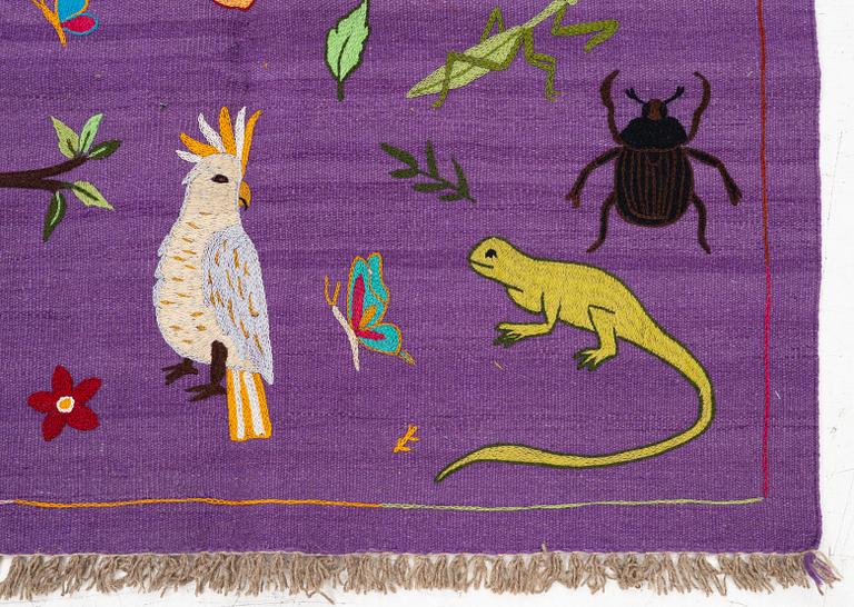 A hand-embroidered Kelim rug, c. 177 x 123 cm.