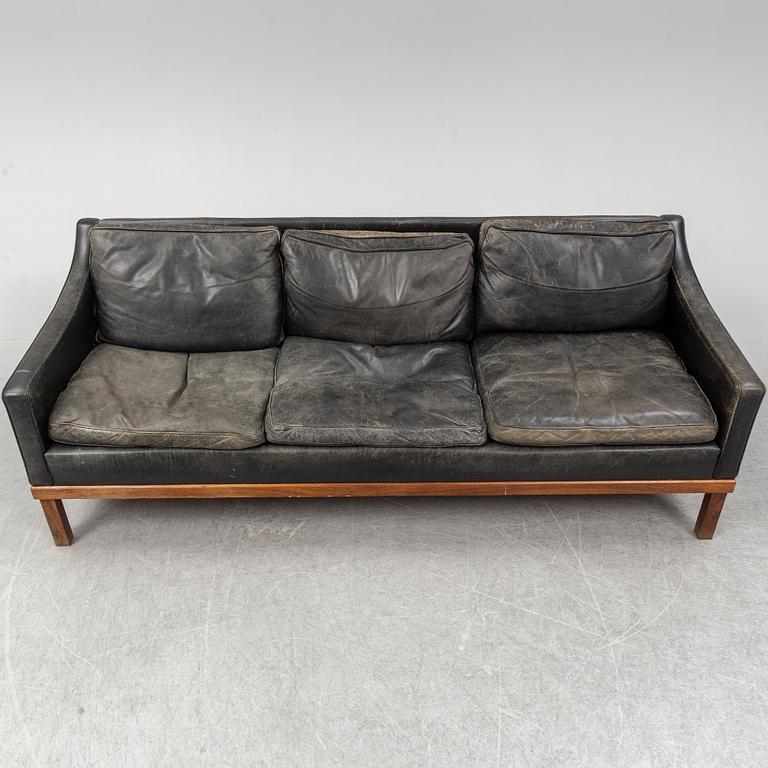 A black leather "The President" sofa by Ingemar Thillmark for OPE-möbler. Sweden.