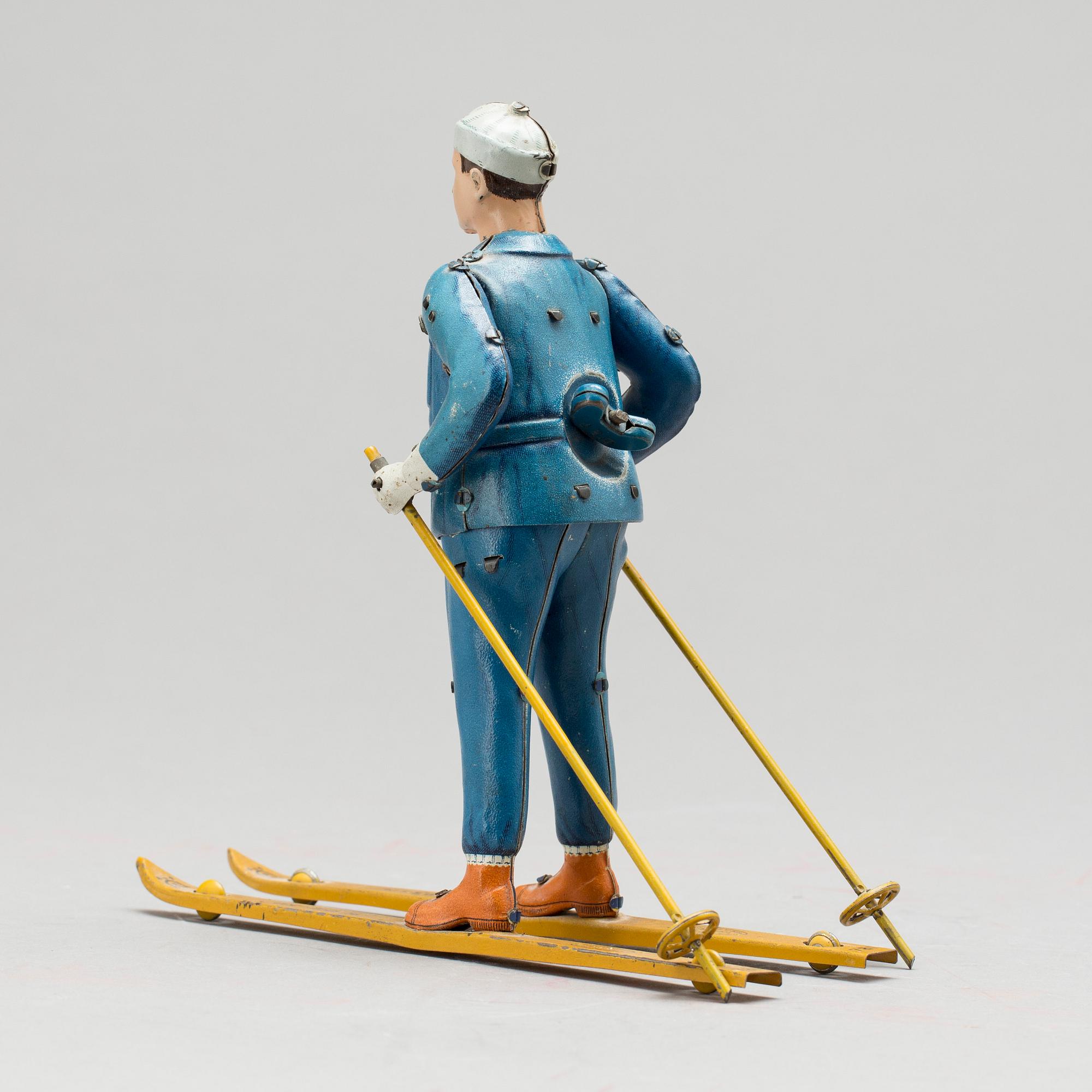 MEKANISK LEKSAK, litograferad plåt. "Skirolf", Lehmann, Tyskland, tillverkad från 1930 till 1941.