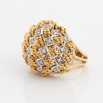 An 18K gold ring set with eight-cut diamonds.