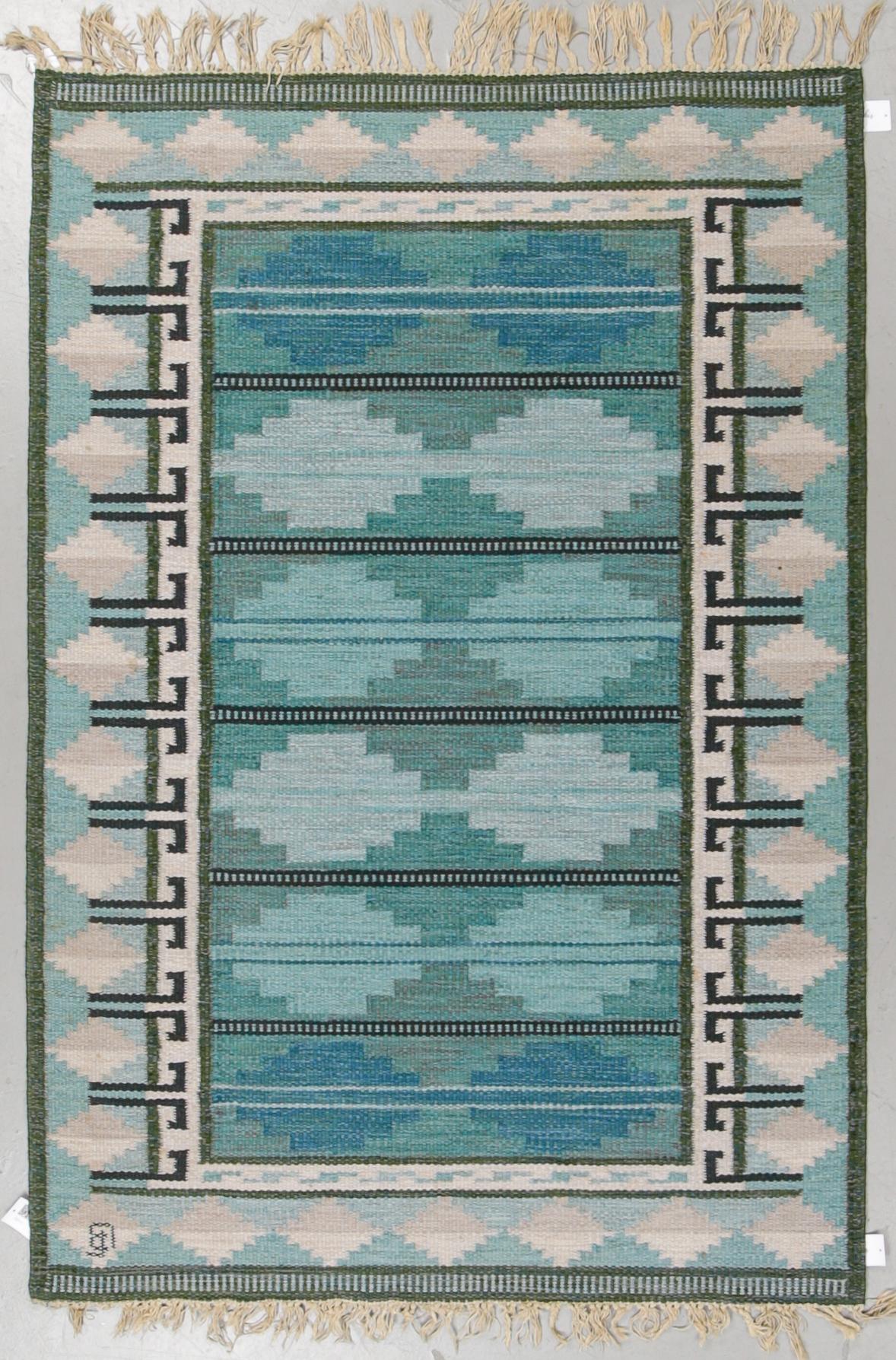 A carpet, flat weave, ca 203,5 x 138,5 cm, indistinct signature.