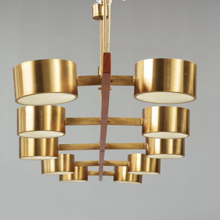A Hans Agne Jakobsson brass and teak ceiling lamp, Markaryd Sweden 1960-70's.