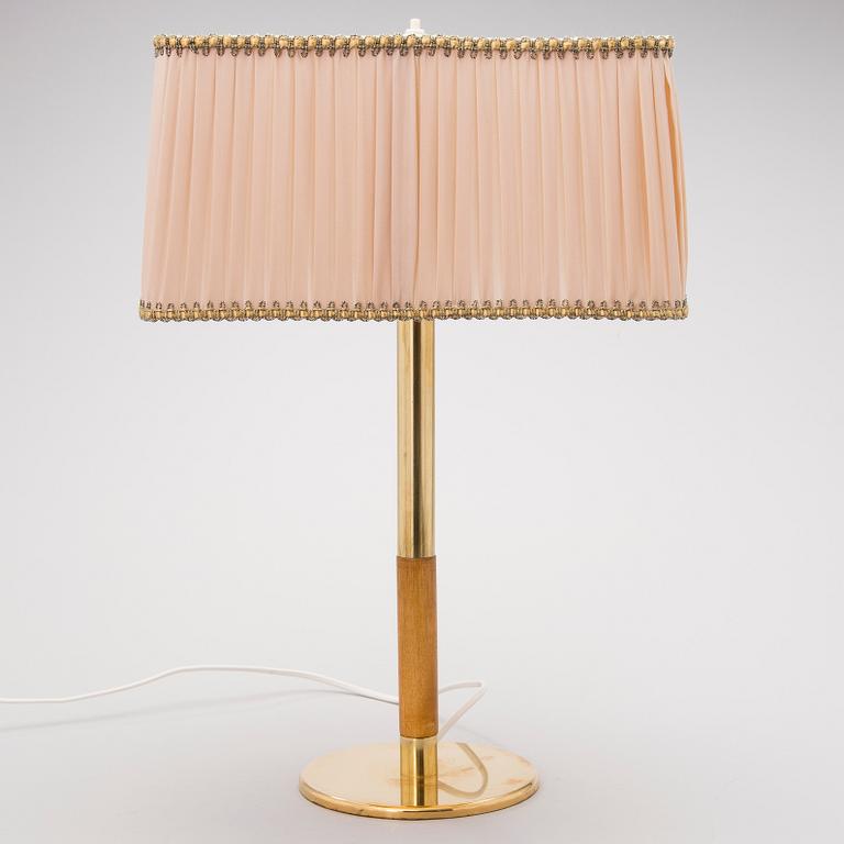 A mid 20th century '9206' table lamp for Taito Finland.