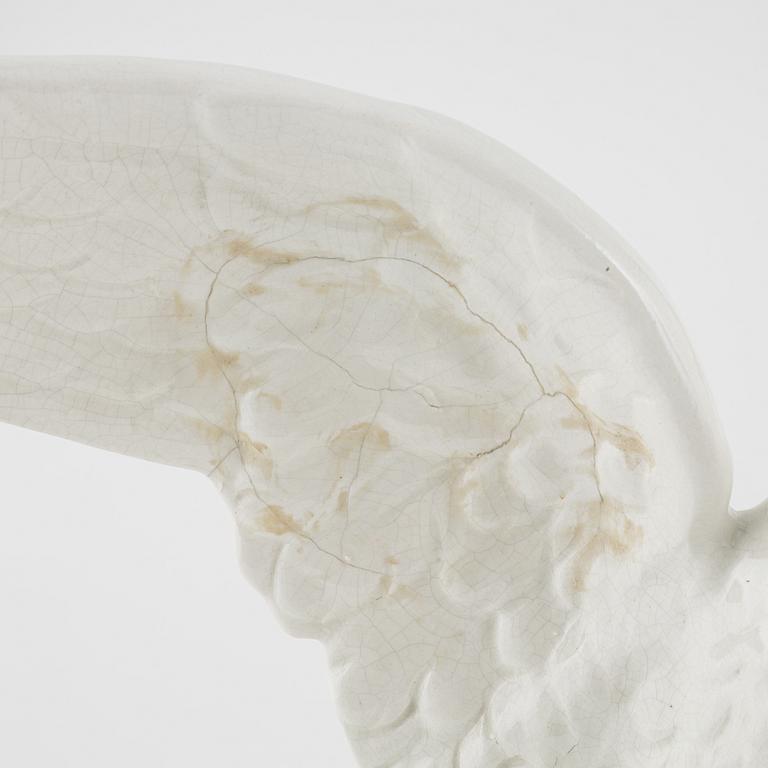 Dekorelement till kakelugn, flintgods, 1900-talets första hälft.