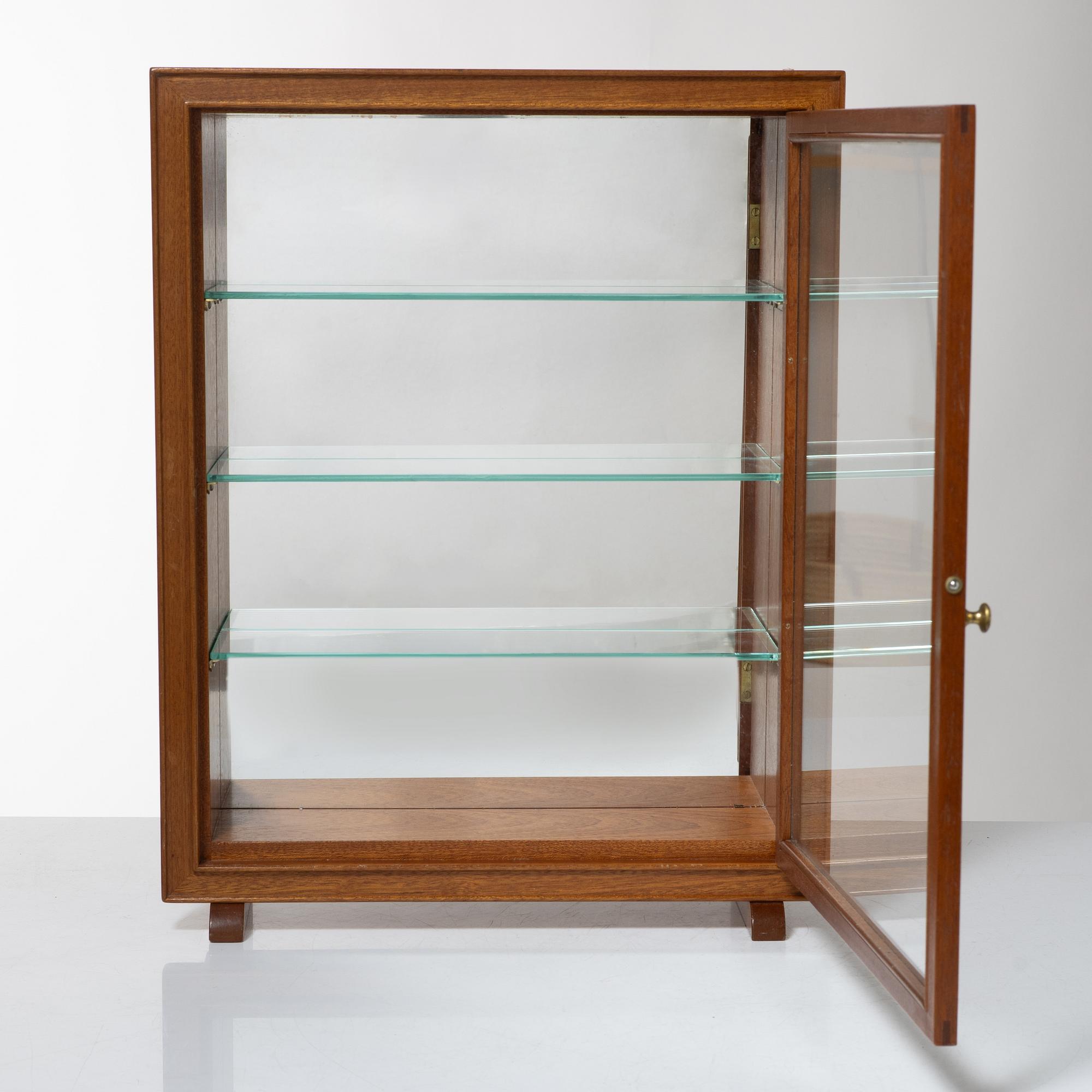 Josef Frank, a mahogany table showcase cabinet, model 2069, Svenskt Tenn, pre 1985.