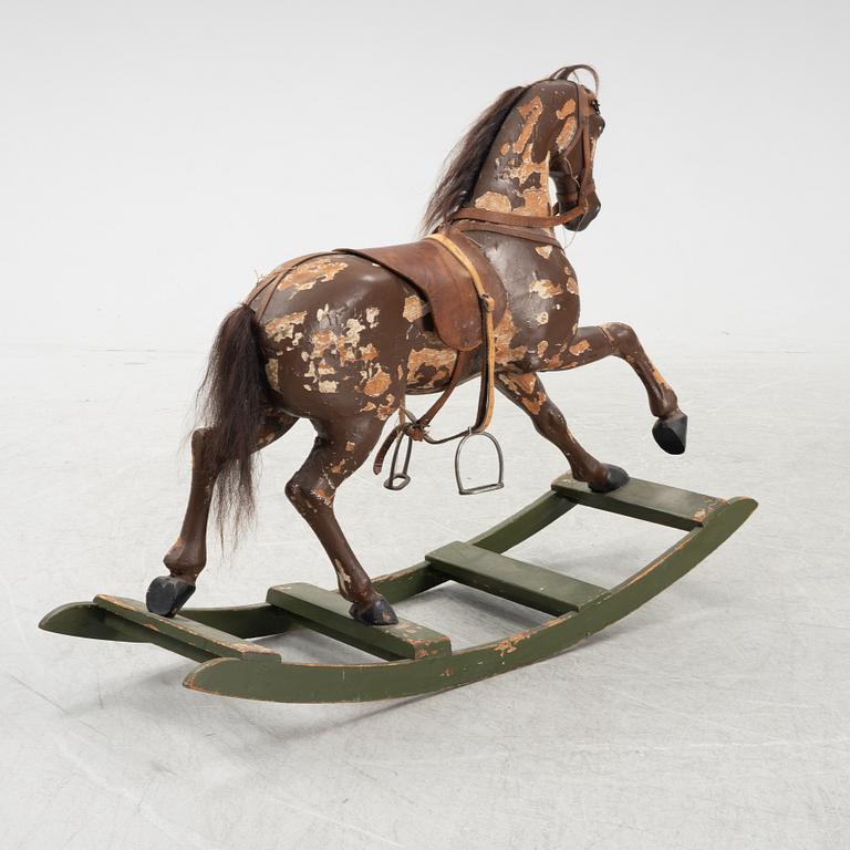 A rocking horse, around the year 1900.