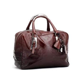 417. PRADA, a brown leather glace zipper bag.