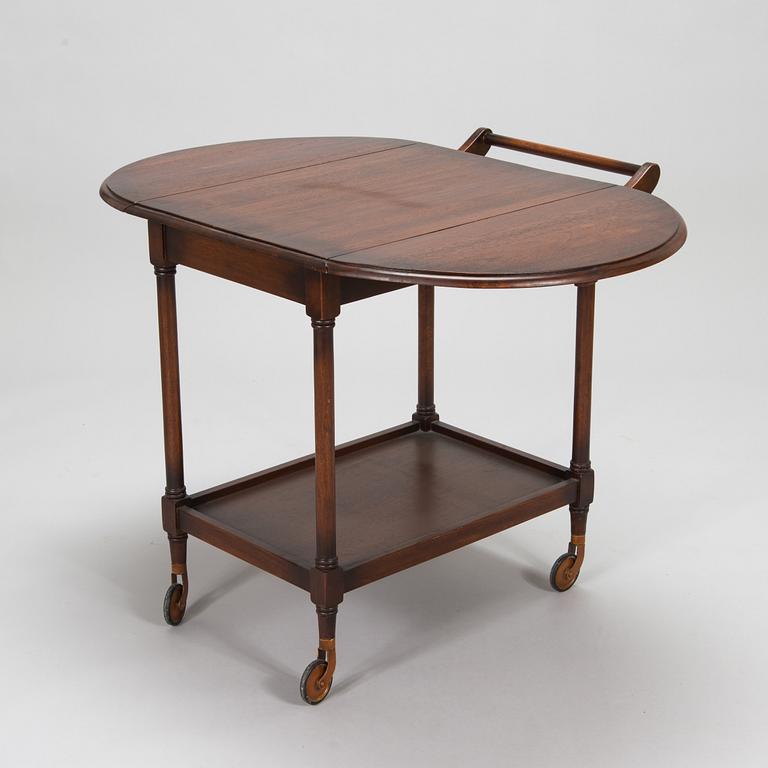 A drop-leaf tea trolley from the latter half of the 20th century.
