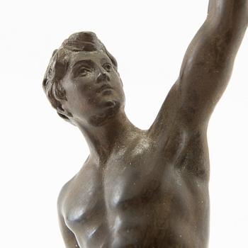 Decorative sculpture, youth with sword.