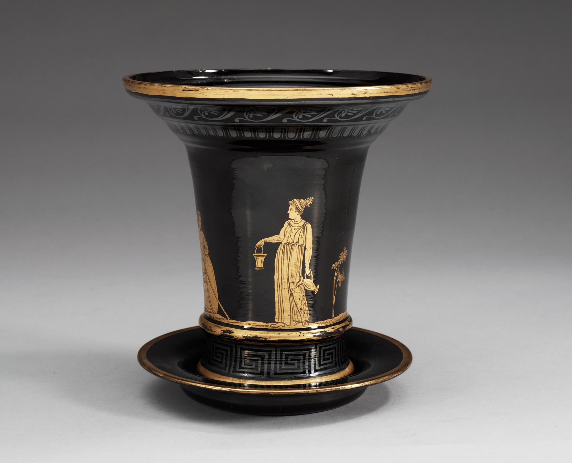 A Russian gilt black Etruscan style glass cache-pot with stand, circa 1800.