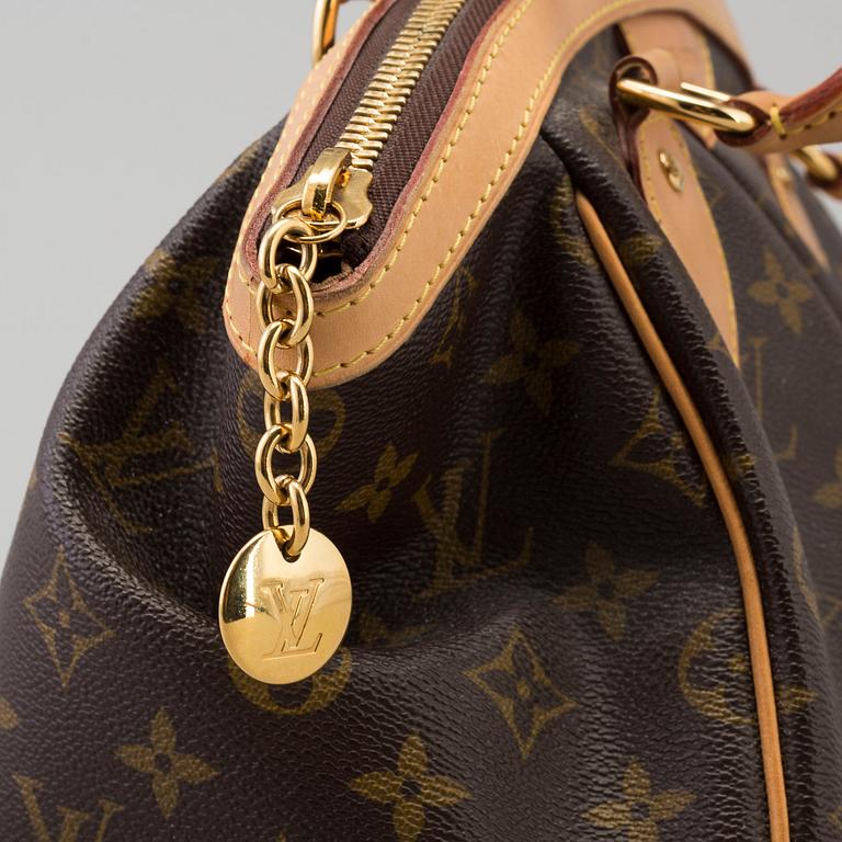 a LOUIS VUITTON 'Tivoli PM' bag.