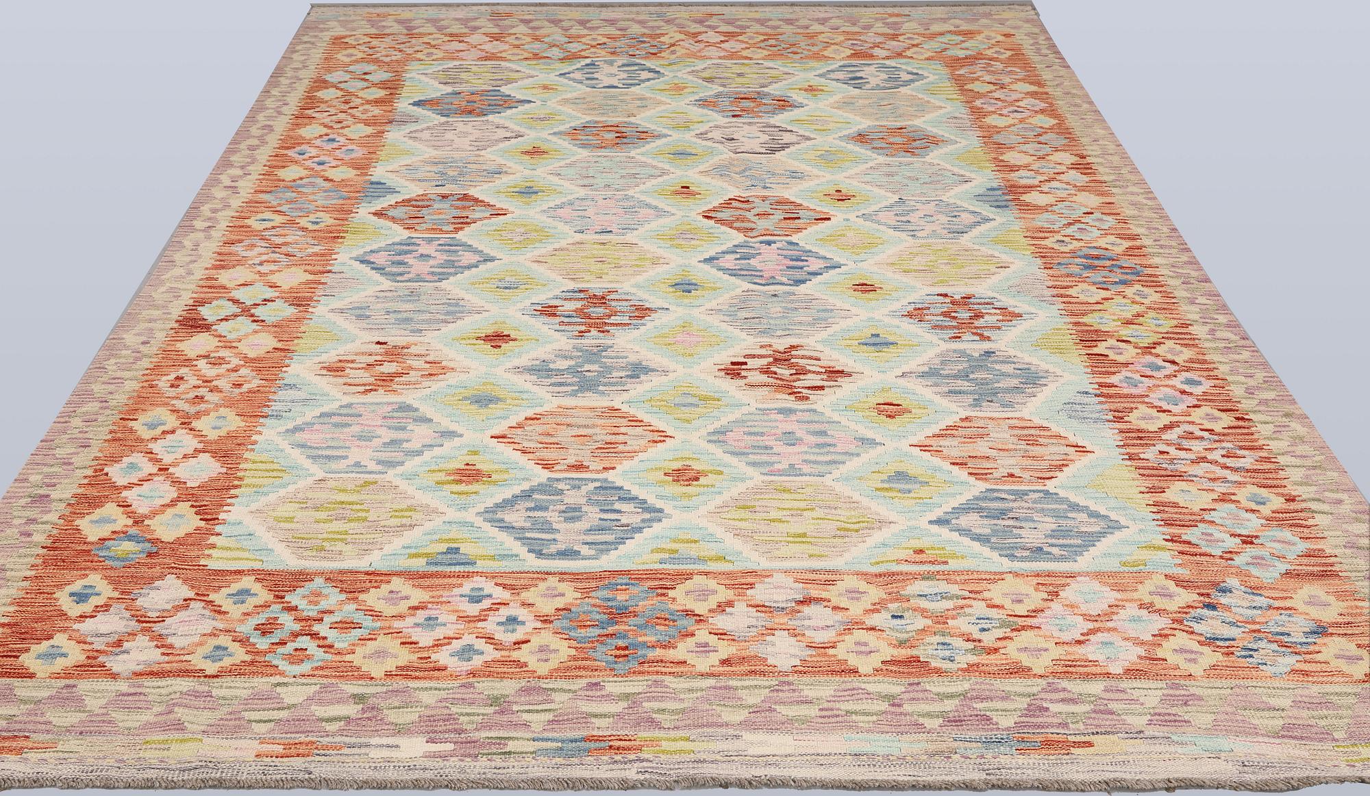 A Kilim carpet, approx. 309 x 203 cm.
