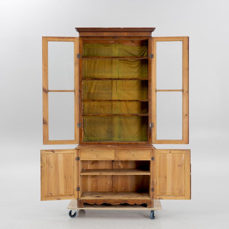 A 19th century walnut veneered  book cabinet.