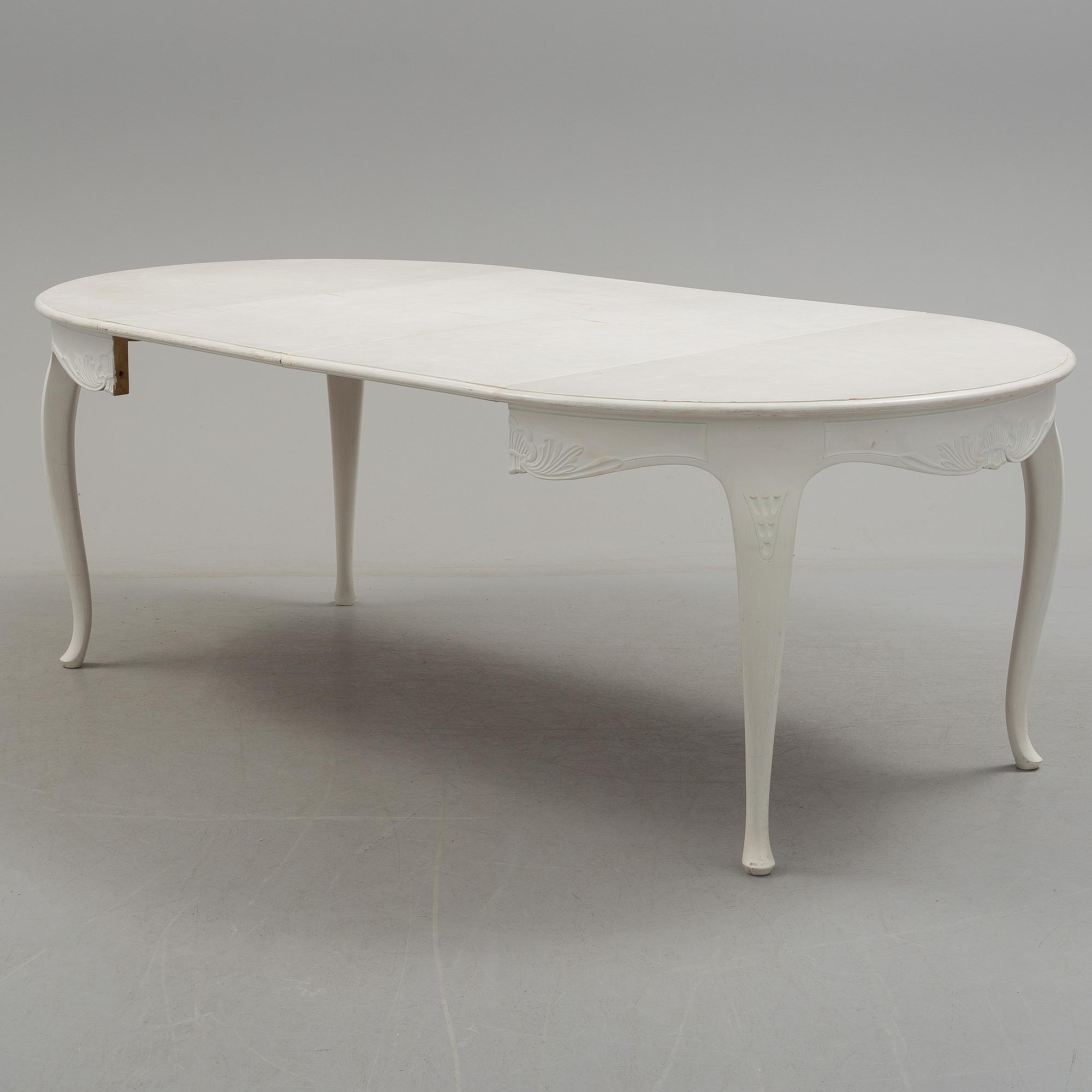 a rococo-style dining table from the 20th century.