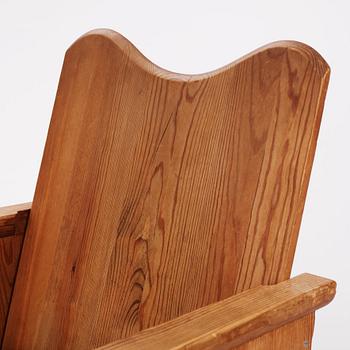 Axel Einar Hjorth, a pair of "Utö" stained pine armchairs, Nordiska Kompaniet 1930s.