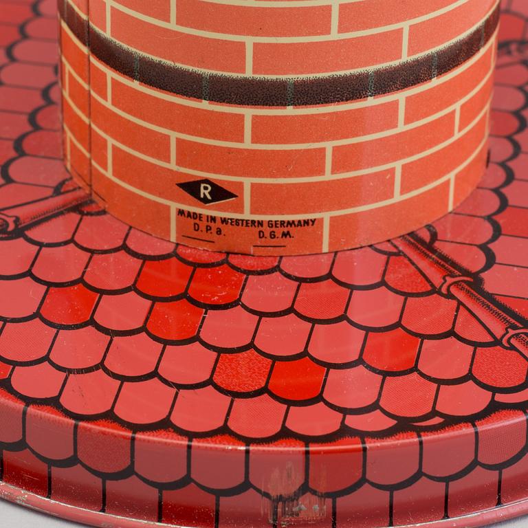 a German tin toy from the middle of the 20th century.