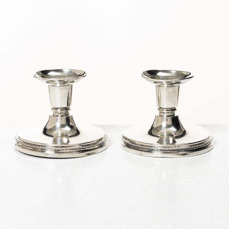A pair of silver candlesticks, MGAB, Uppsala, 1966.