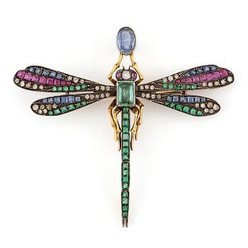 572. A brooch/pendant  in the form of a dragonfly with emeralds, rubies, sapphires and diamonds, Russia 1899-1908.