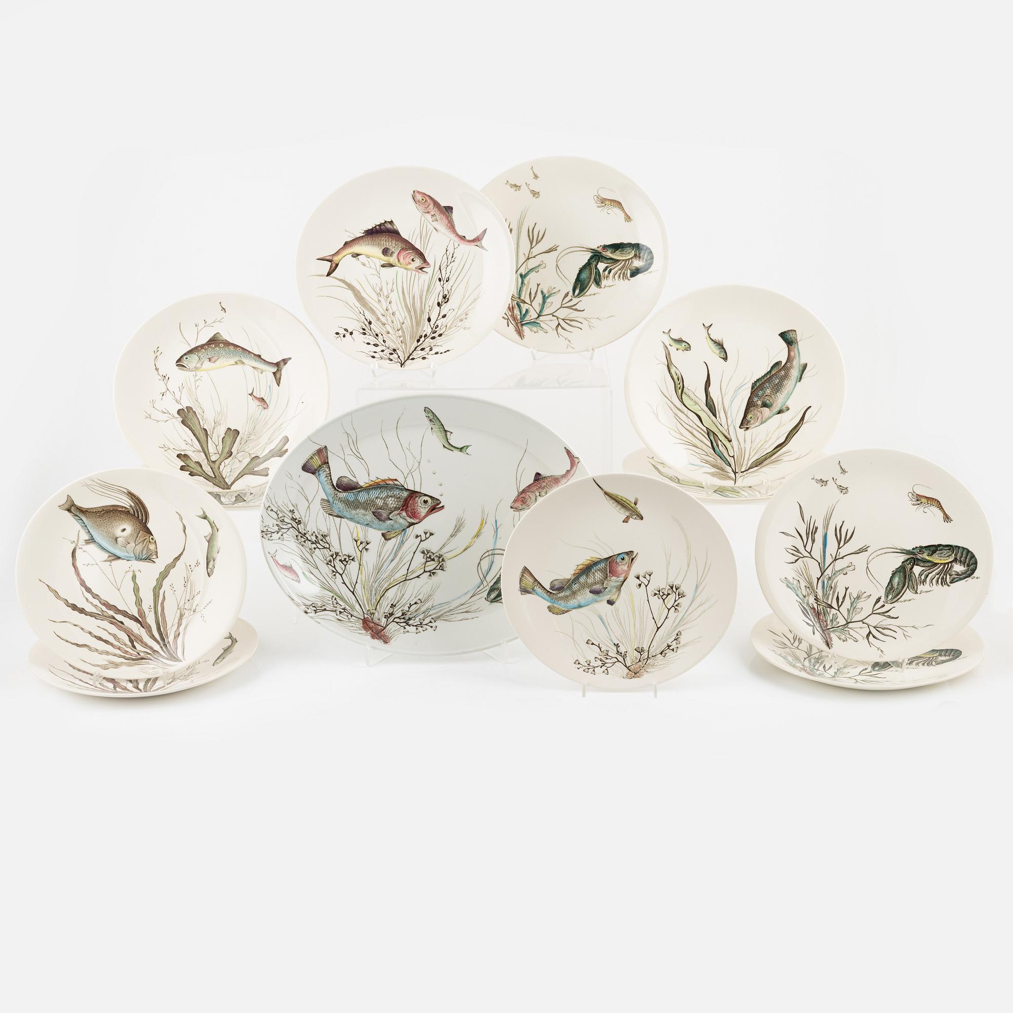 Eleven creamware plates and dish, 'Fish', Johnson Brothers, England.