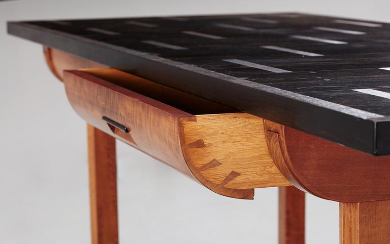 Hjalmar Jackson, A Hjalmar Jackson ebony and pearwood desk/library table, Stockholm ca 1934.