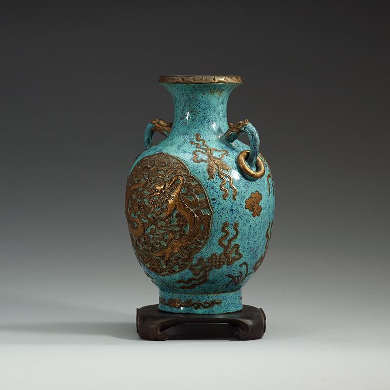 A gold relief against robins egg glazed vase, China, presumably Republich, 20th Century, with Qianlong sealmark.