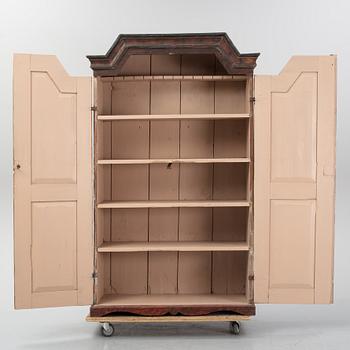 A Swedish painted cupboard dated 1863.