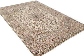 A Keshan carpet, c. 355 x 240 cm.