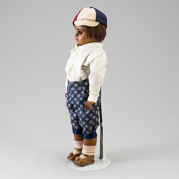 A bisque head doll marked E.D depoussé, France, early 20th century.