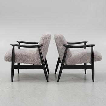 A pair of easy chairs, 1950's/60's.