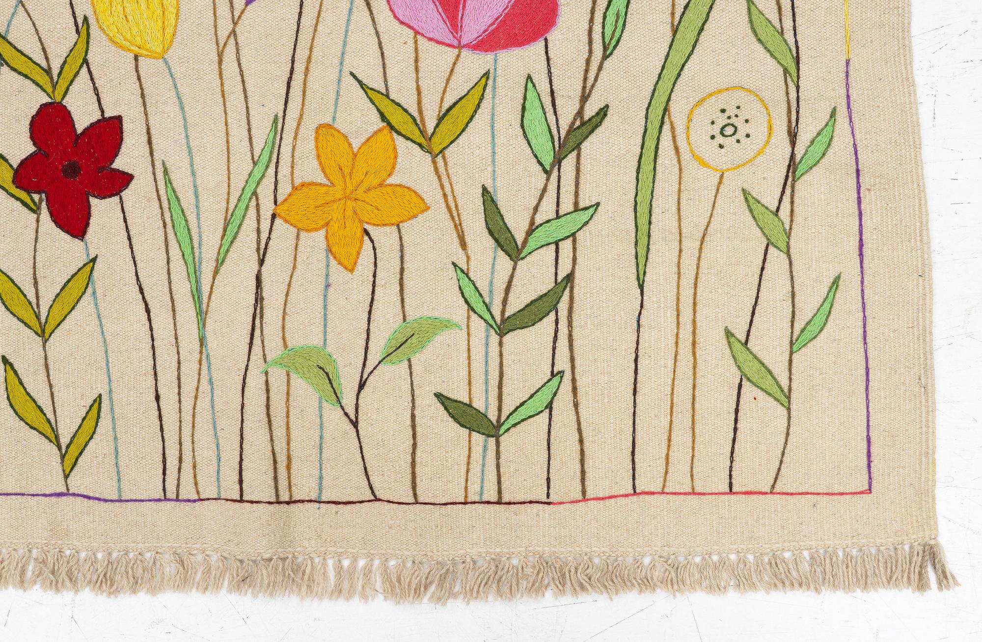 A hand-embroidered Kelim, c. 182 x 123 cm.