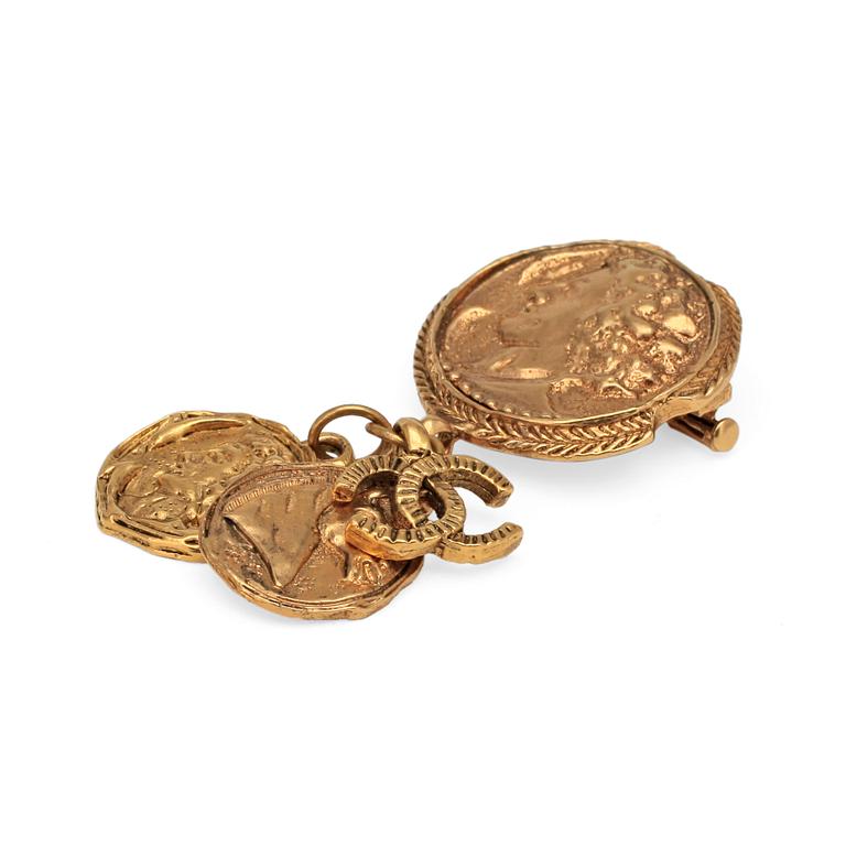CHANEL, a brooch.