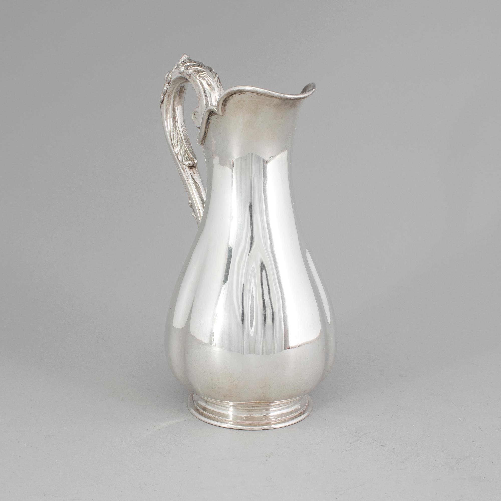 A Swedish silver water pitcher, maker's mark Gustaf Theodor Folcker, Stockholm, 1860. Weight 647 g.