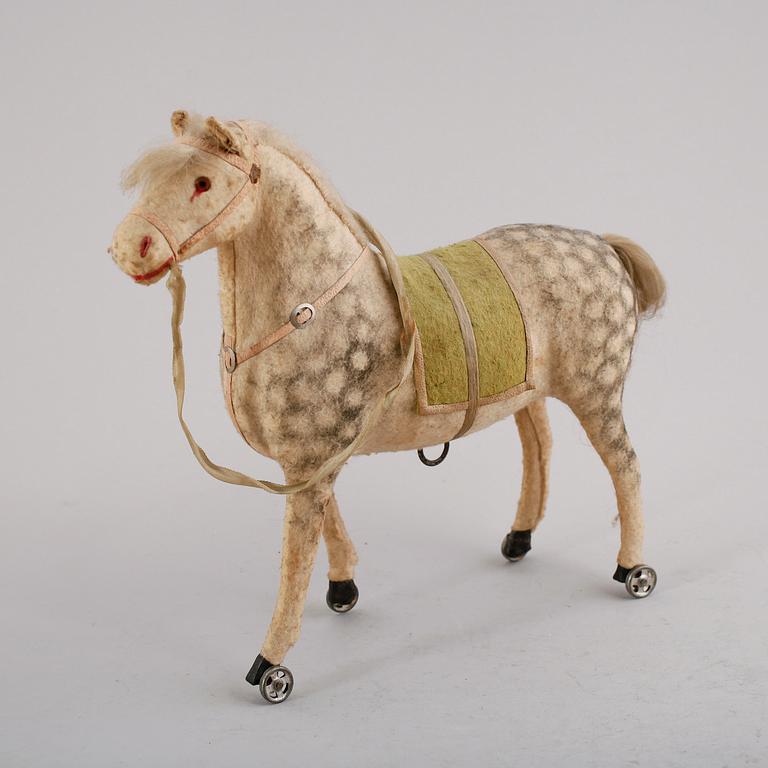LEKSAKSHÄST, 1900-talets mitt.