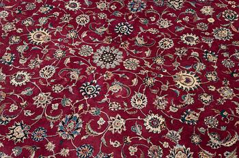 An oriental carpet, a. 378 x 278 cm.