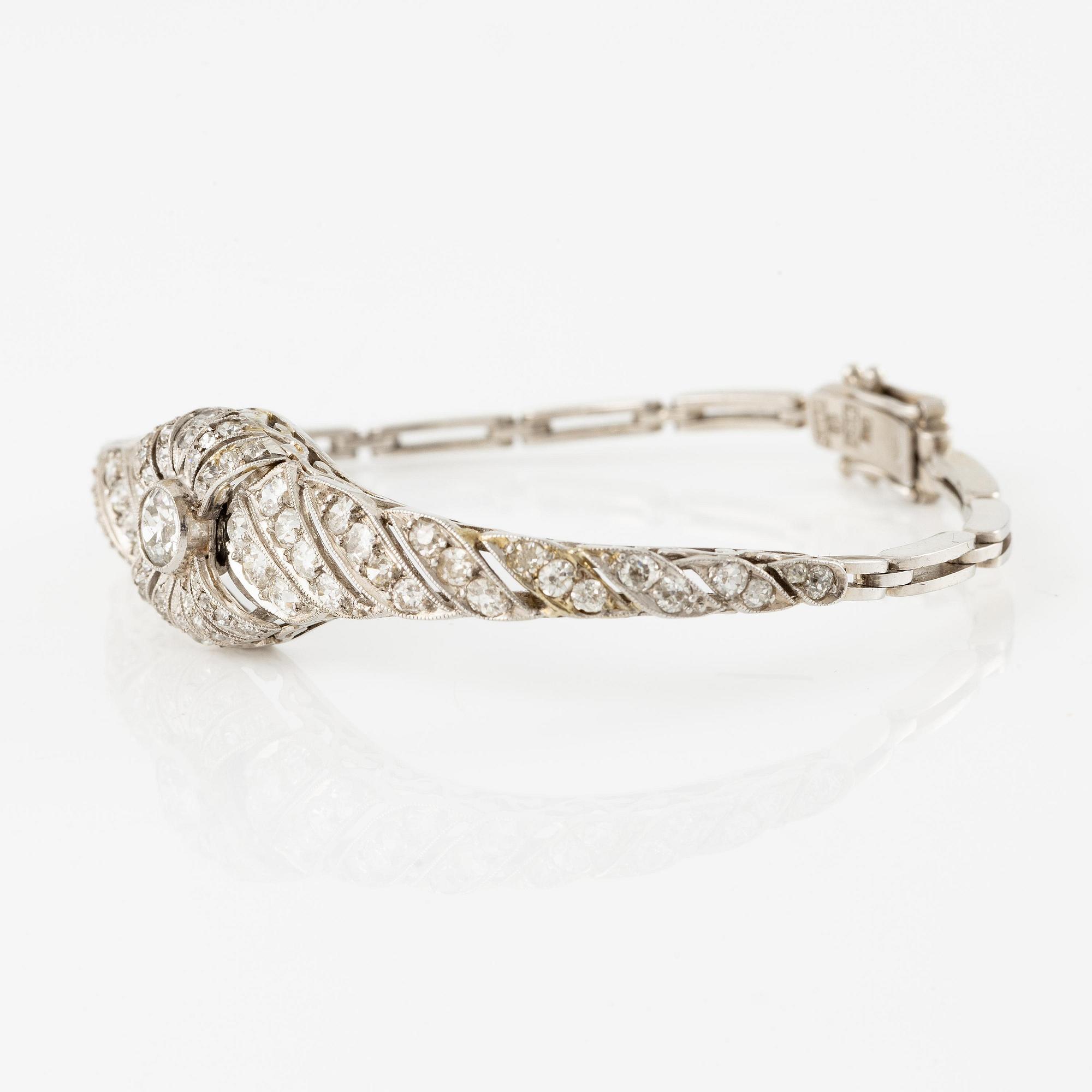 An 18K white gold bracelet with old- and eight-cut diamonds.