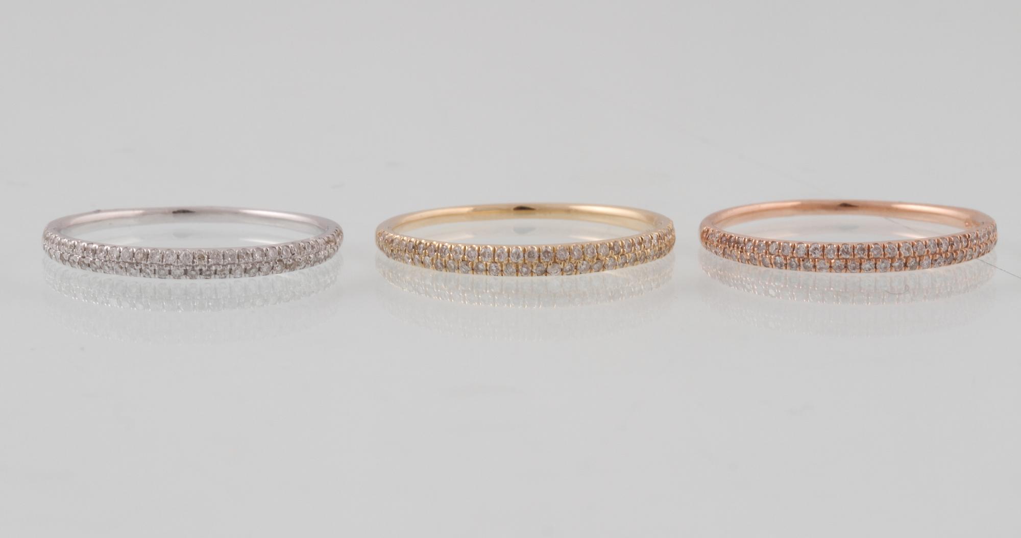 RINGAR, 3 st, 14K trefärgat guld med briljantslipade diamanter totalt ca 0.54 ct. Vikt 3,4 gram.