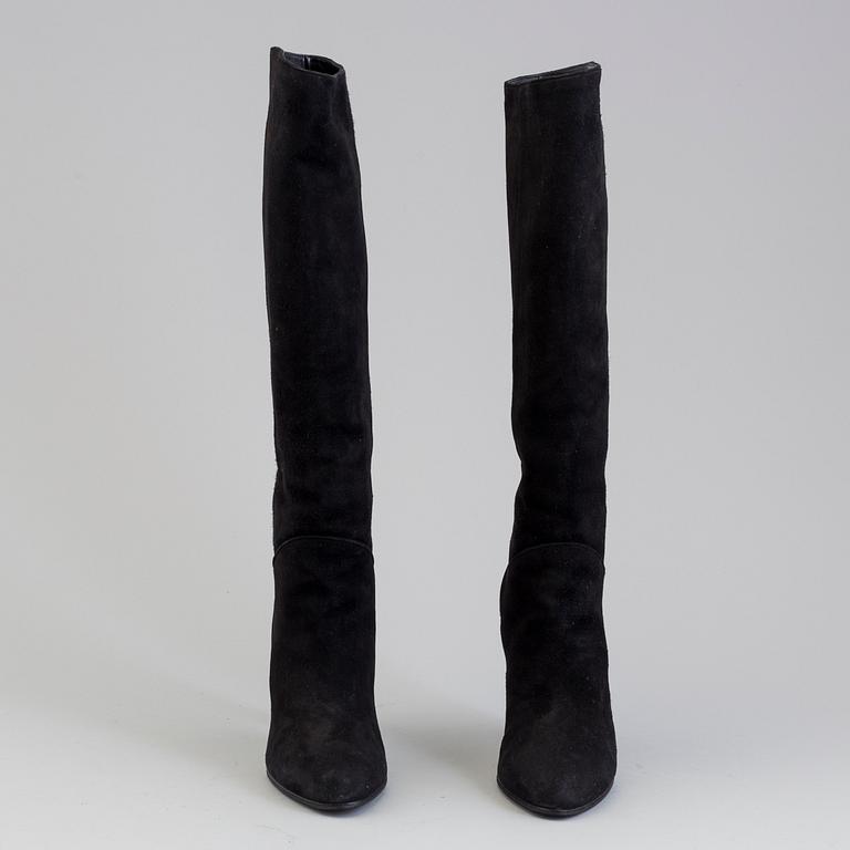 Black suede boots by Yves Saint Lurent.