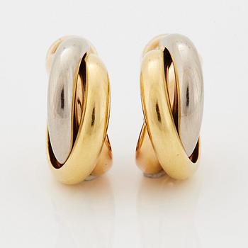A pair of Cartier "Trinity" earrings in 18K gold.