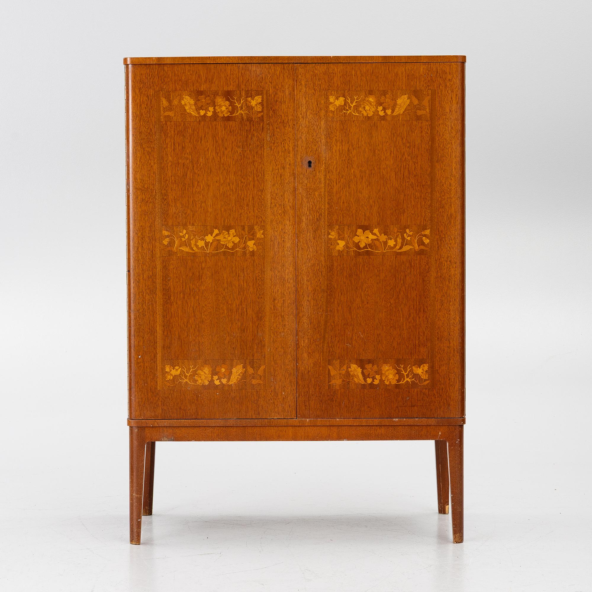 A Swedish Modern cabinet, 1940s.