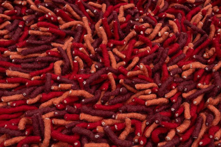 A Nanimarquina hand made, 'Cuks Red', carpet c 240 x 170 cm.