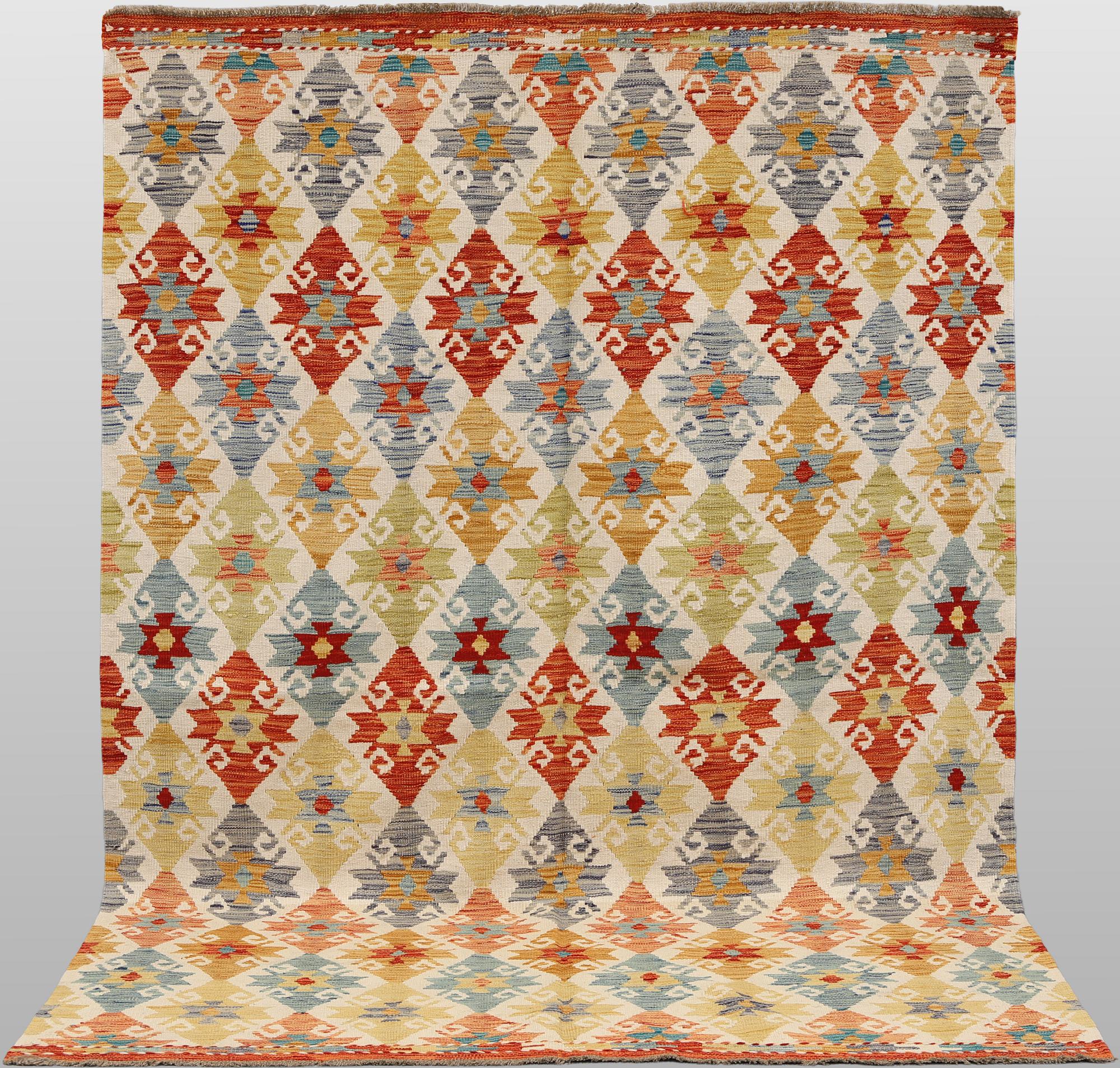A Kilim rug, approx. 254 x 174 cm.