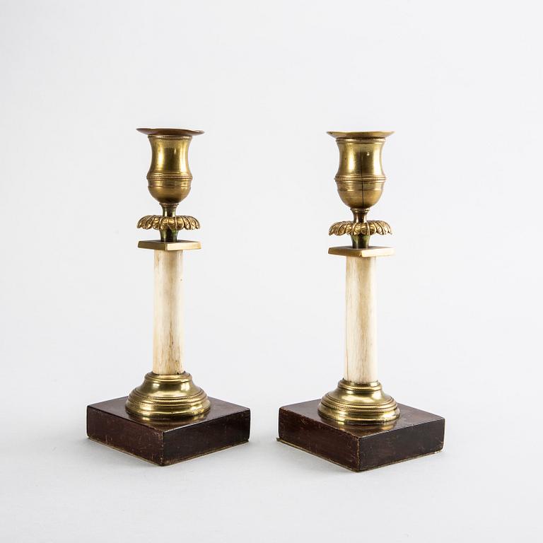 A pair of late empire  candlesticks, ca 1850.