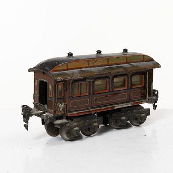 Model train with track and station building, 13 pieces, Germany, 1920s.